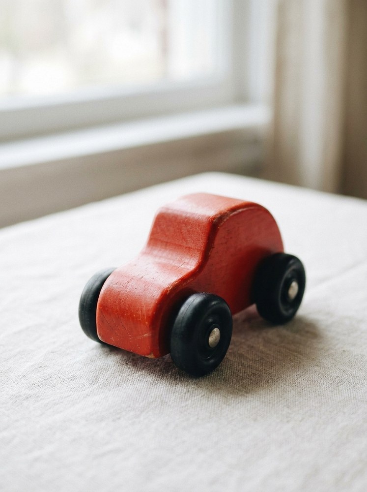 A real wooden toy car
